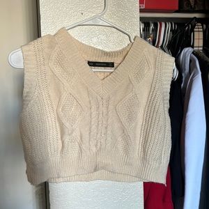 Cream colored cropped knitted top